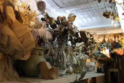 Panoramic shot of clothes hanging on display at store