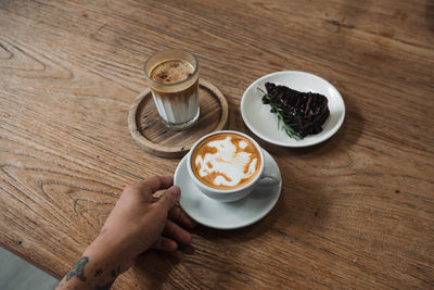 High angle view of coffee cup on table