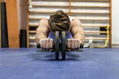 Man exercising in gym