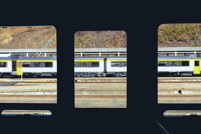 Train at railroad station platform against sky