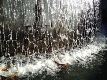 Waves splashing on rocks