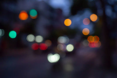 Defocused image of illuminated lights at night