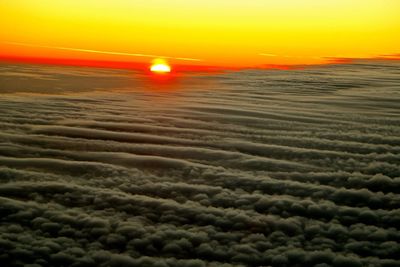 Scenic view of dramatic sky during sunset