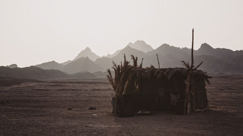 Panoramic view of mountains against clear sky