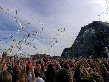 Crowd against sky