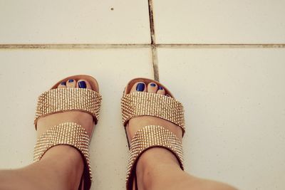 Close up of woman wearing sandals