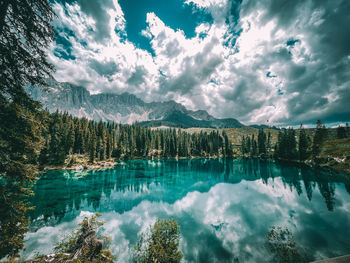 Panoramic view of lake and mountains against sky