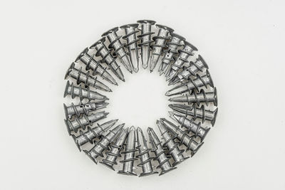 High angle view of dental equipment over white background