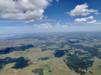 Aerial view of dramatic landscape against sky