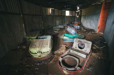 Bumper car graveyard in empty amusement park