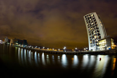 Reflection of illuminated structures in river