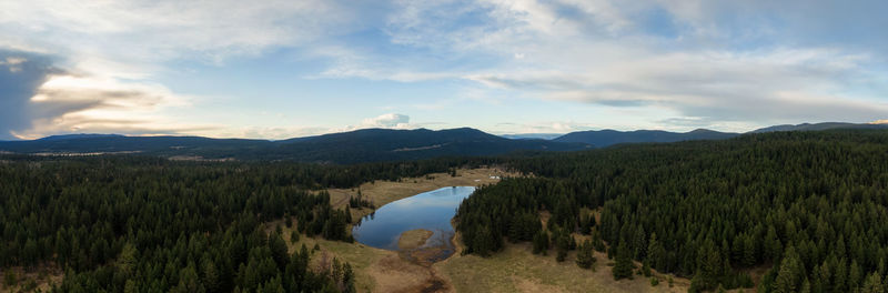 Panoramic view of landscape and mountains against sky