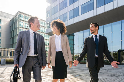 Business colleagues standing in city