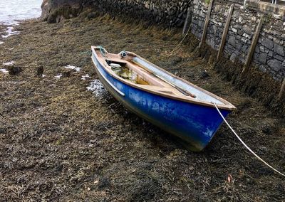 High angle view of boat moored in water