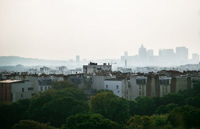 View of cityscape against clear sky