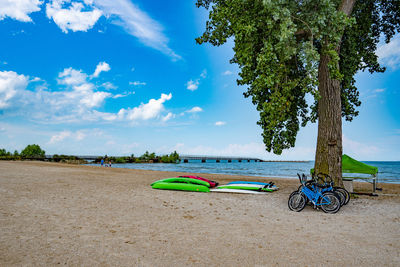 Scenic view of beach against blue sky