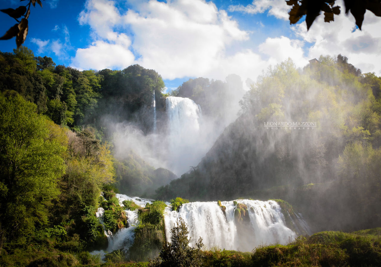 nature, waterfall, beauty in nature, scenics, motion, tree, sky, no people, outdoors, tranquil scene, water, day, forest, power in nature