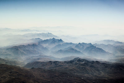 Scenic view of mountains against sky during winter