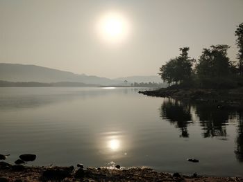 Scenic view of lake during sunset