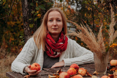 Blond girl with apples