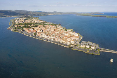 Aerial view of the seaside town of orbetello on the tuscan coast in the maremma eastern lagoon