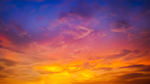 Low angle view of dramatic sky during sunset