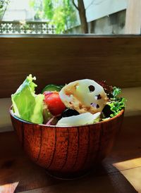 Close-up of salad in bowl on table