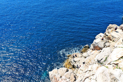 High angle view of rocks on beach