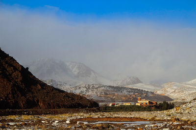 Scenic view of mountains against sky during winter