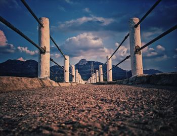 View of bridge against cloudy sky