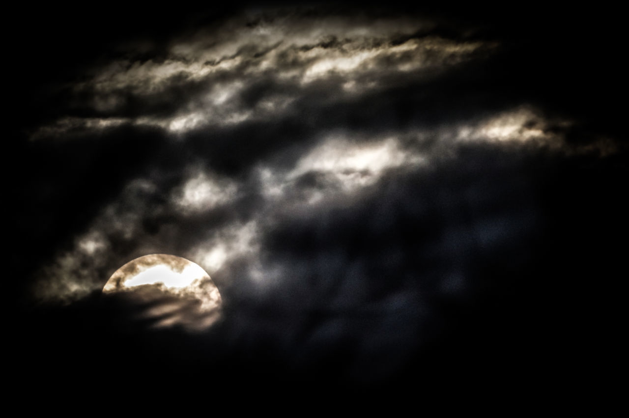 cloud - sky, low angle view, sky, tranquility, cloudy, tranquil scene, dramatic sky, scenics, overcast, storm cloud, dark, weather, nature, moon, majestic, cloudscape, atmospheric mood, beauty in nature, storm, outdoors, ominous, history, atmosphere, no people