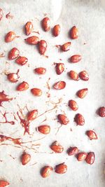 Close-up of strawberry over white background