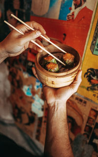 High angle view of man eating food