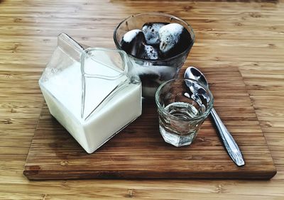 High angle view of dessert served on wooden tray