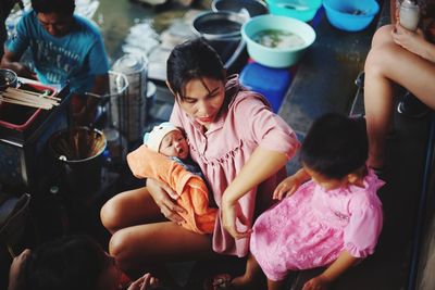 High angle view of father and daughter playing