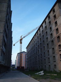 Low angle view of buildings against sky in city