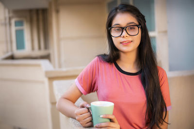 Young woman using mobile phone