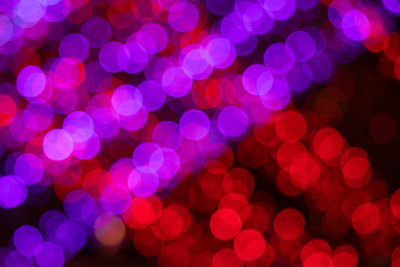 Defocused image of illuminated lights at night