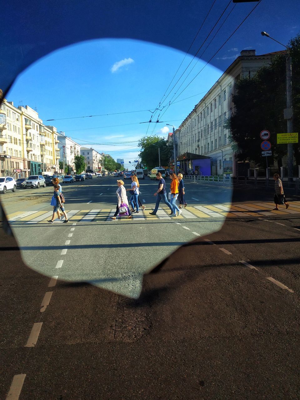 GROUP OF PEOPLE ON STREET