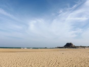 Scenic view of beach against sky