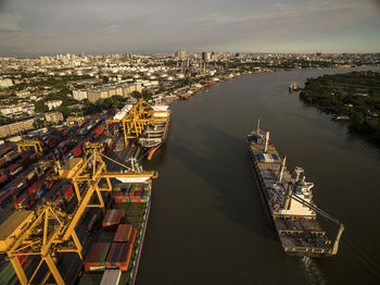 High angle view of river amidst buildings in city