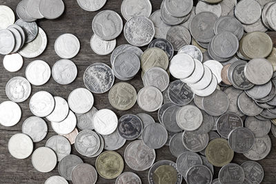 High angle view of coins on table