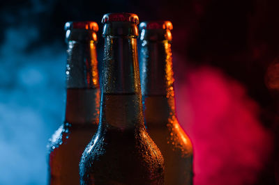 Close-up of beer glass bottle