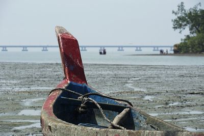 Close up of head boat over the beach