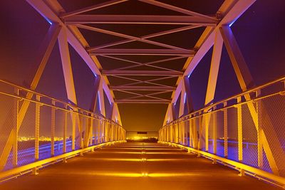 Low angle view of illuminated walkway