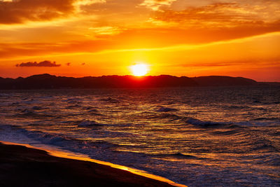 Scenic view of sea against sky during sunset