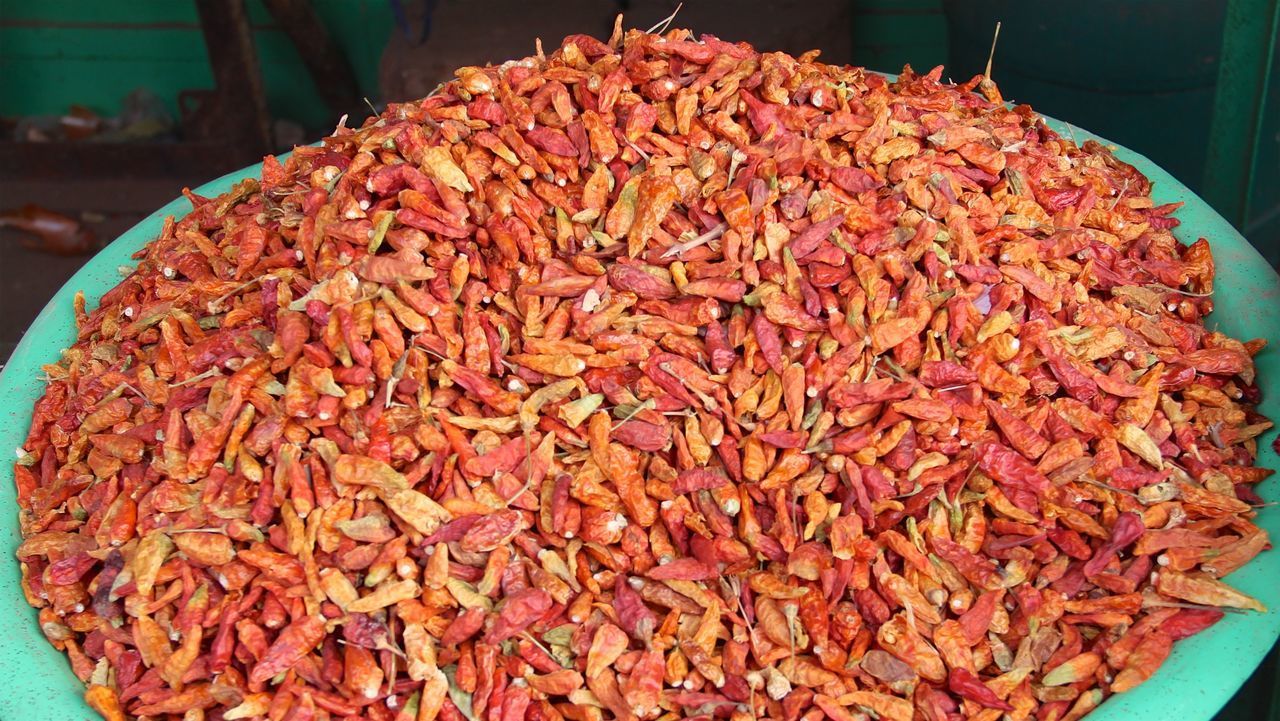 CLOSE-UP OF CARROTS FOR SALE AT MARKET