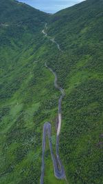 High angle view of winding road on land