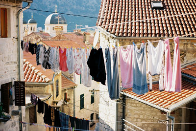 Low angle view of clothes hanging in store