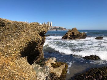 Scenic view of sea against clear sky